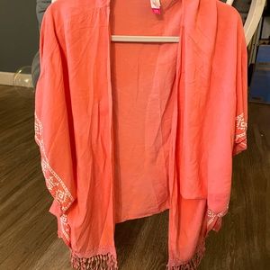 Tribal embroidered over cover.